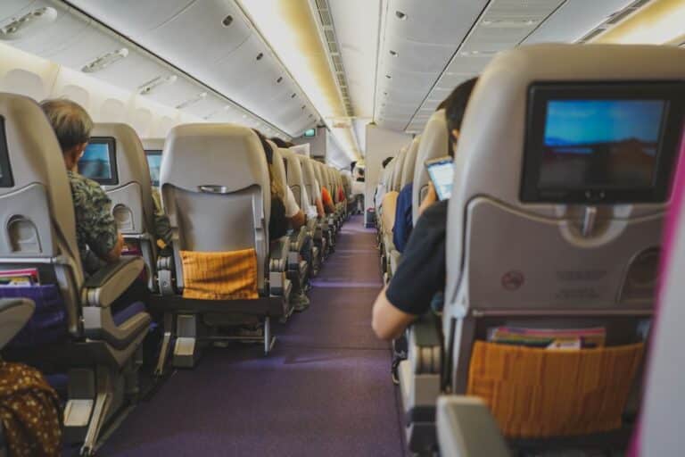 how to survive long flights in economy